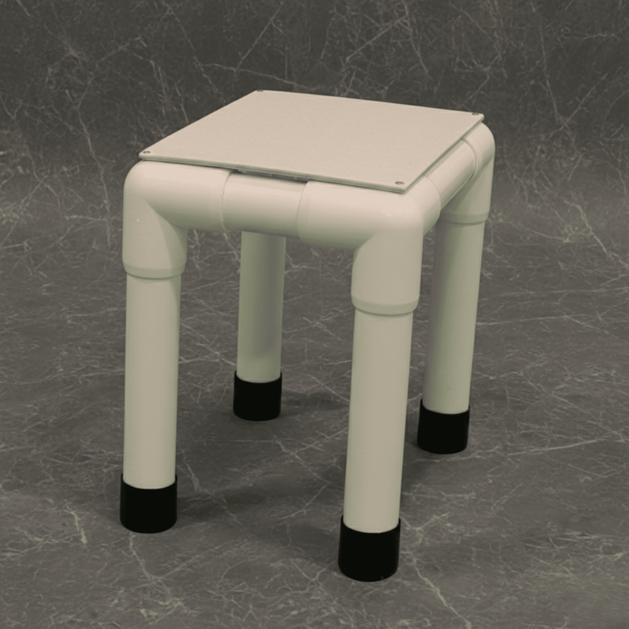 45(UP)(SQ) - footstool in gray tiles