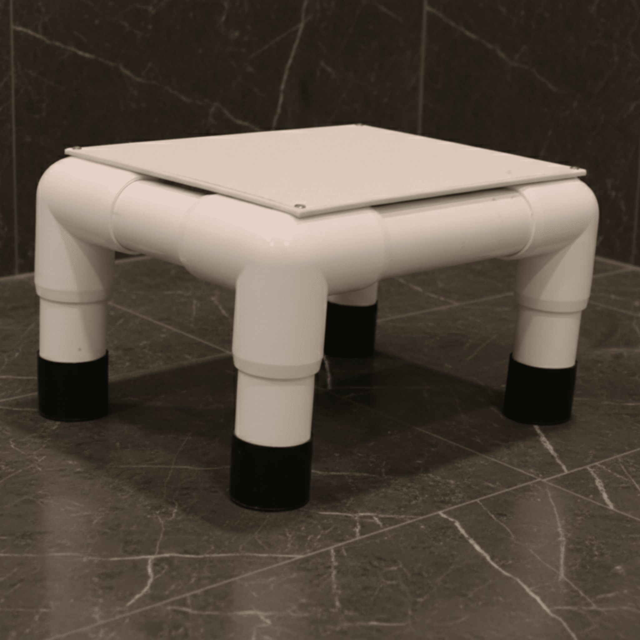 40(UP)(SQ) - Footstool in gray tiles